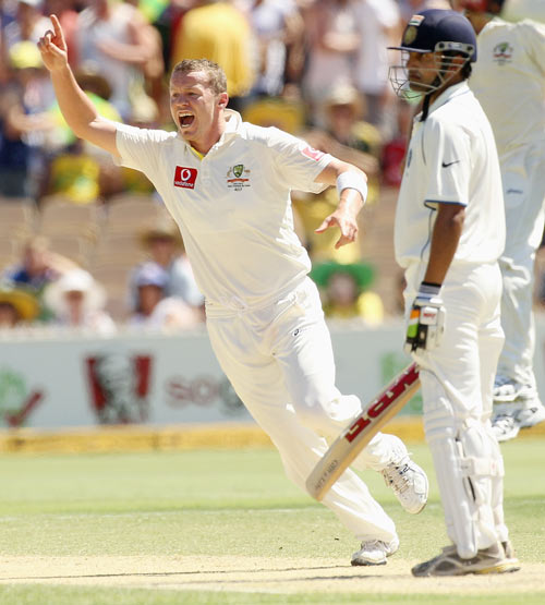 Peter Siddle of Australia celebrates the wicket of Gautam Gambhir of India during day three of the Fourth Test Match between Australia and India at Adelaide Oval