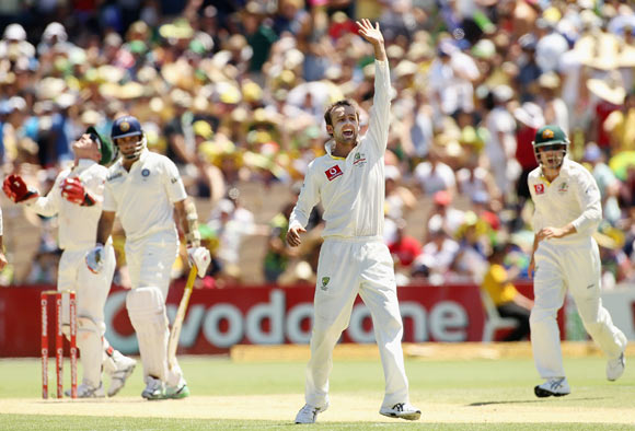 Nathan Lyon of Australia appeals successfully for the wicket of VVS Laxman of India during day three of the Fourth Test Match between Australia and India at Adelaide