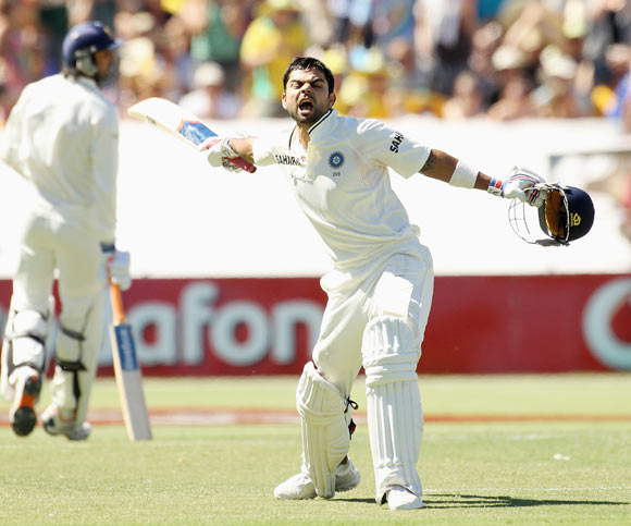 Virat Kohli of India celebrates his century during day three of the Fourth Test Match between Australia and India at Adelaide Oval