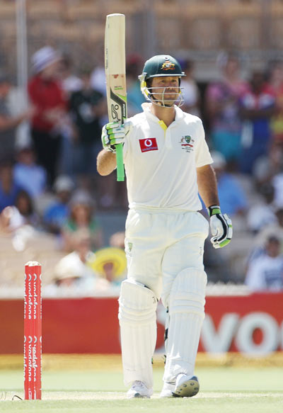 Ricky Ponting celebrates after getting to 50 runs
