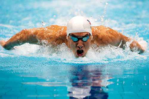 Michael Phelps of the United States competes in heat 5 of the Men's 200m Butterfly on Day 3 of the London 2012 Olympic Games
