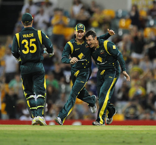 David Hussey celebrates after picking up a wicket