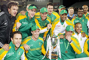 South Africa players celebrate winning the ODI series against New Zealand, in Auckland on March 3