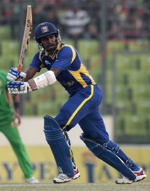 Chamara Kapugedara plays a shot during his knock against Bangladesh