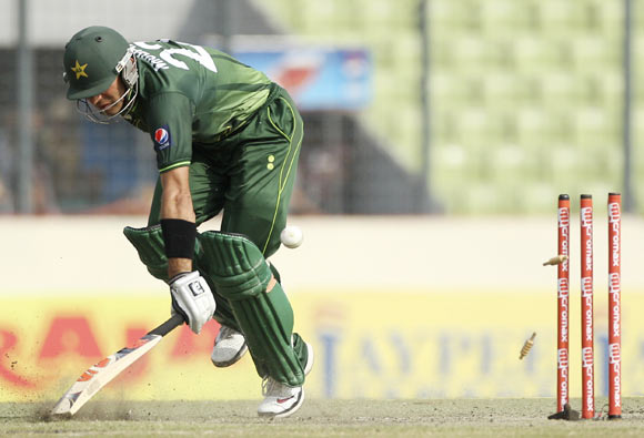 Pakistan's captain Misbah-ul-Haq is run out against Bangladesh
