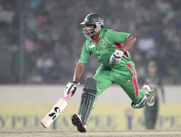 Bangladesh's Tamim Iqbal runs between the wicket against Pakistan during the final match of Asia Cup