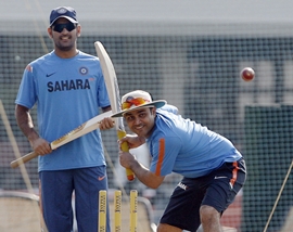 Dhoni watches Sehwag bat in the nets