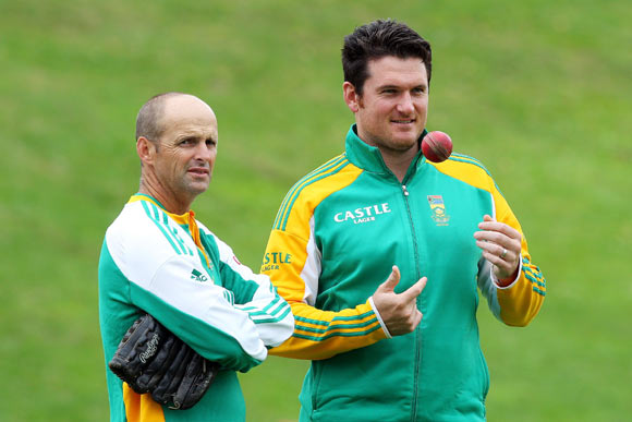 Coach Gary Kirsten (L) and captain Graeme Smith of South Africa look on during day two of the Third Test match between New Zealand and South Africa at Basin Reserve