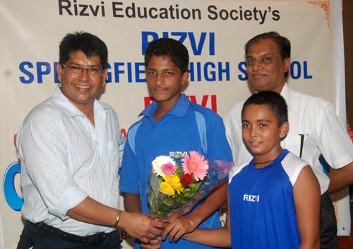Left to right: Chandrakant Pandit, Armaan Jaffer, Prithvi Shaw and Javed Rizvi, trustee Rizvi Education Society