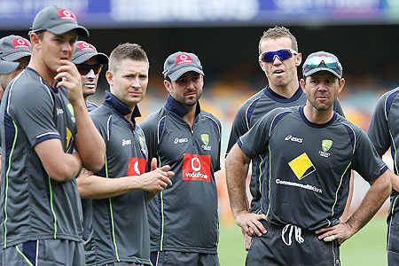 Josh Hazlewood, Mike Hussey, Michael Clarke, Ed Cowan, Peter Siddle and Ricky Ponting look on during an Australian training session at The Gabba on Wednesday