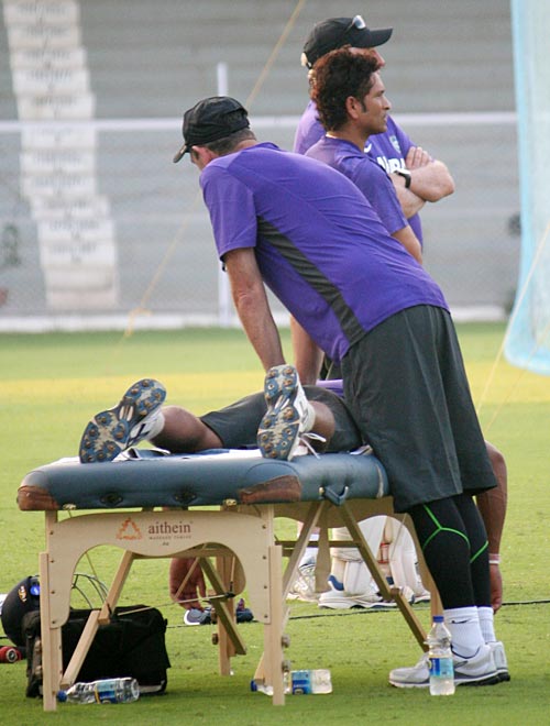 Umesh Yadav relaxes after the practice session