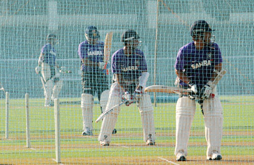 Sachin Tendulkar, Cheteshwar Pujara and Virender Sehwag bat in the nets during Friday's practice session at the Brabourne stadium