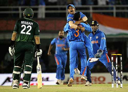 Indian players celebrate after winning the match