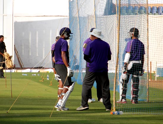 Cheteshwar Pujara and Harbhajan bat in the nets as coach Duncan Fletcher looks on