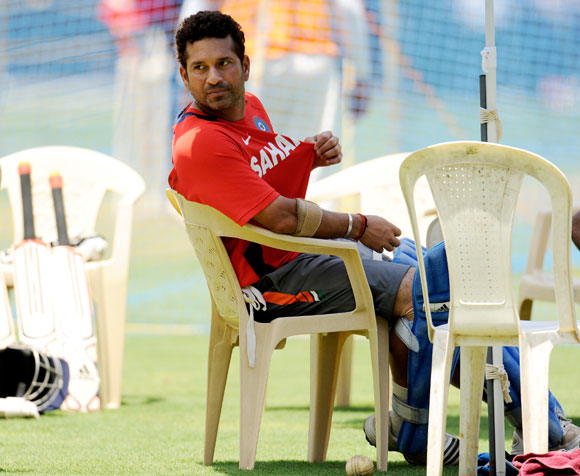 India's Sachin Tendulkar looks on as he takes a break during a training session at the Wankhede Stadium