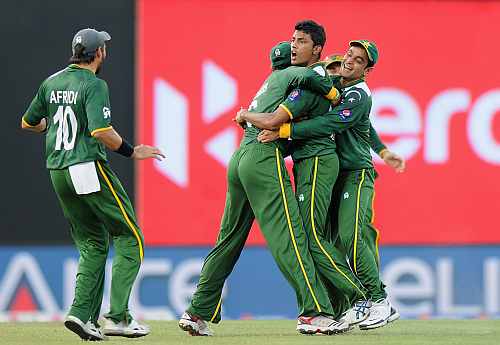 Raza Hasan is congratulated by teammates after dismissing Shane Watson during the ICC World Twenty20