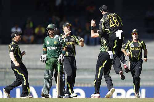Australia's players celebrate dismissal of Pakistan's captain Mohammad Hafeez during their Twenty20 World Cup Super 8 match in Colombo