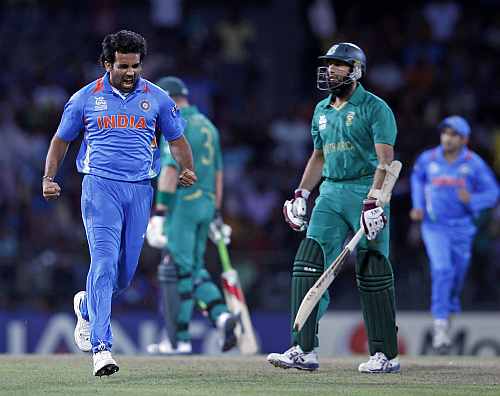 India's Zaheer Khan celebrates taking the wicket of South Africa's Hashim Amla during their Twenty20 World Cup Super 8 cricket match in Colombo