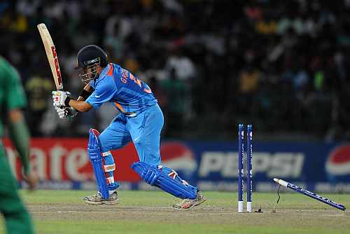 Gautam Gambhir of India gets bowled out by Albie Morkel during the ICC World Twenty20 2012 Super Eights Group 2 match between South Africa and India