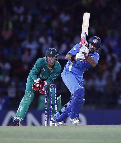 India's Yuvraj Singh hits a shot during their Twenty20 World Cup Super 8 cricket match against South Africa in Colombo