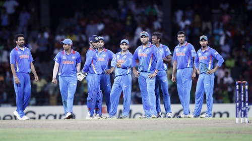 India's players stand on the field