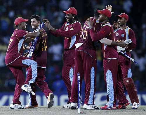 West Indies players celebrate after they won their Twenty20 World Cup semi-final match against Australia in Colombo