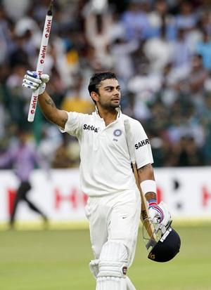 Virat Kohli celebrates after victory is clinched