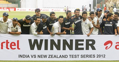 India's cricket team poses for a photo after they won the match and the series against New   Zealand