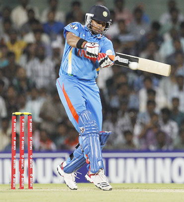 India's Suresh Raina hits a shot during their second Twenty20 cricket match against New Zealand in Chennai