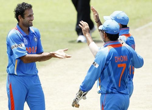 Irfan Pathan and Mahendra Singh Dhoni celebrate a wicket. Photograph: Dinuka Liyanawatte/Reuters