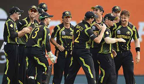 Australia's Shane Watson is congratulated by teammates after dismissing Ireland's Porterfield during the World Twenty20 group B match at the R. Premadasa Stadium, Colombo
