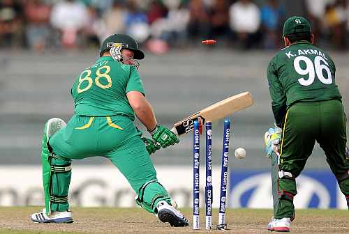 Richard Levi of South Africa is bowled out by Saeed Ajmal of Pakistan during the Super Eight match between Pakistan and South Africa