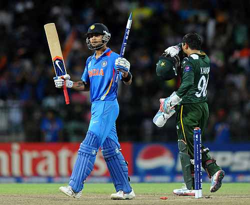 Virat Kholi celebrates victory in the ICC T20 World Cup, Super Eight group 2 match between Pakistan and India