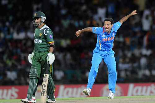 Imran Nazir looks on as Irfan Pathan celebrates after taking his wicket during the ICC T20 World Cup, Super Eight group 2 match between Pakistan and India