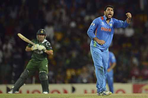 India's Yuvraj Singh celebrates after dismissing Pakistan's Akmal during ICC World Twenty Super 8 match against India at R Premadasa Stadium
