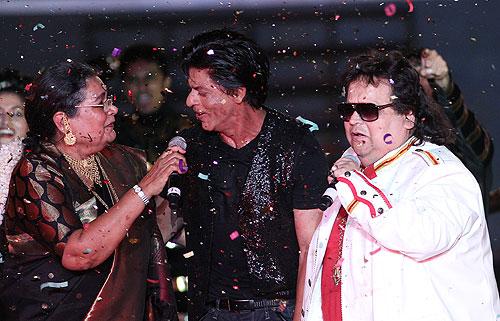 Shah Rukh Khan with Usha Uthup and Bappi Lahiri