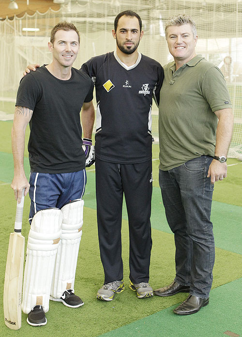 Former Australia cricket players Damien Martyn (left) and Stuart MacGill (right) with Victorian player Fawad Ahmed during a meeting at the Sydney Cricket Ground Indoor Nets on March 28, 2013