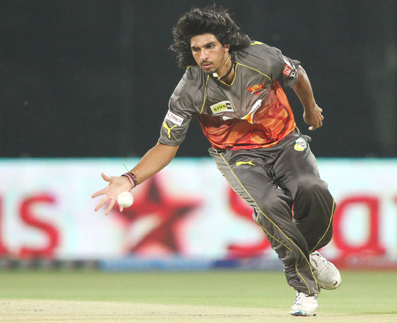 Ishant Sharma of Sunrisers Hyderabad fields the ball off his own bowling