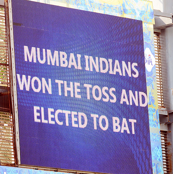 A shot on the giant screen reflects the toss result