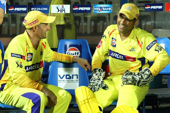 CSK's Mike Hussey with MS Dhoni (right)