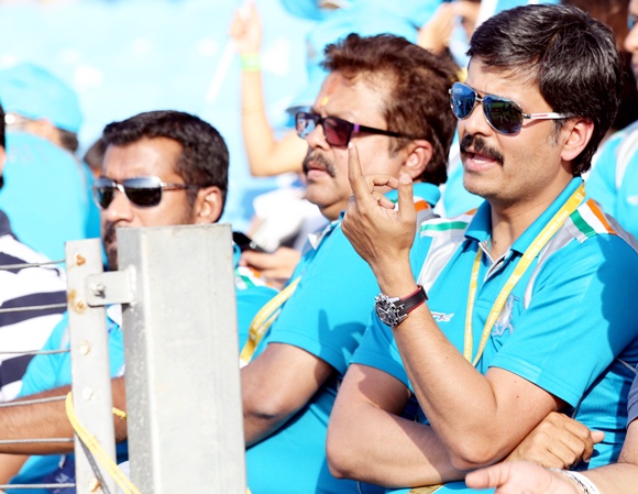 Abhijit Sarkar, director, and Sushanto Roy, owner of Pune Warriors, watch the match from the stands