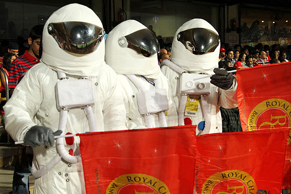 RCB fans in cool astronaut gear