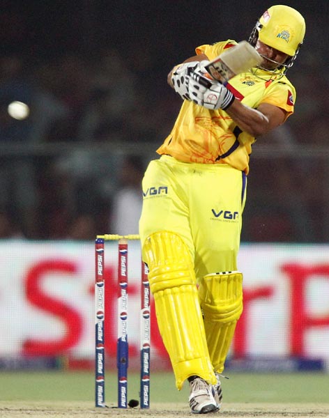 Suresh Raina pulls a delivery to the boundary