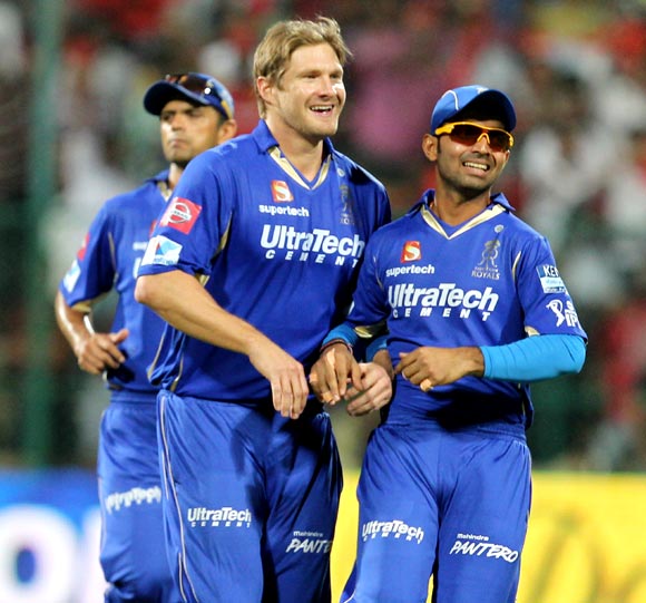 Shane Watson (left) and Ajinkya Rahane celebrate the wicket of Tillakaratne Dilshan