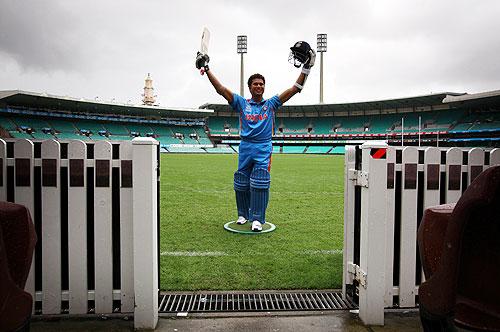 A wax figure of Indian cricketer Sachin Tendulkar stands on the Sydney Cricket Ground during a promotional event for Madame Tussauds wax museum on Saturday. The wax figure will go on permanent display at the museum in Sydney