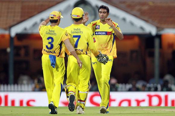 Ravichandran Ashwin celebrates the wicket of Ajinkya Rahane