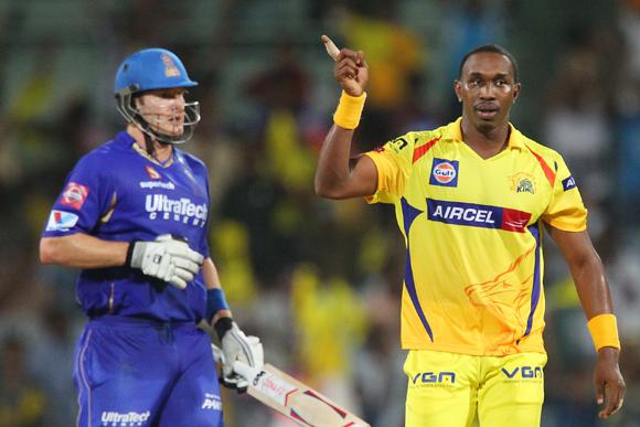 Dwayne Bravo celebrates the wicket of Shane Watson