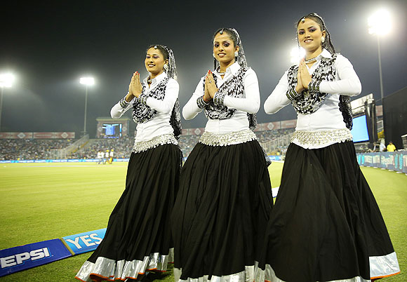 Cheergirls pose before the match between The Kings XI Punjab and the Pune Warriors in Mohali on Sunday