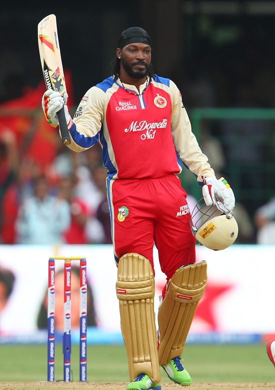 Chris Gayle celebrates after gettting to fifty
