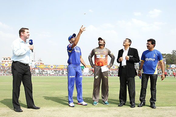 Rajasthan Royals captain Rahul Dravid tosses the coin as Sunrisers Hyderabad captain Kumar Sangakkara calls on Saturday
